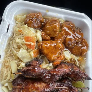 Orange chicken, chicken on a stick, and pansit!