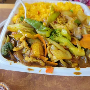 Over Seasoned Curry Chicken with Mixed.  Had a nerve to charge $3 extra to add mixed vegetables