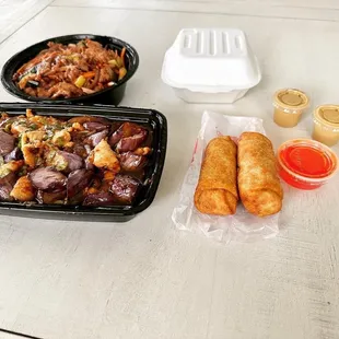 two trays of food on a table