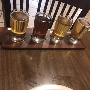 Flight of Shiner beer(. Strawberry Blonde, Bock, Homespun Cream Ale, Shiner Premium)