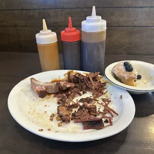 Half of everything I ordered except the smoked chicken, that was delicious! Three mystery BBQ sauces.