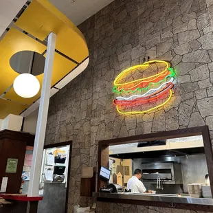 Love the neon sign and awning over the counter