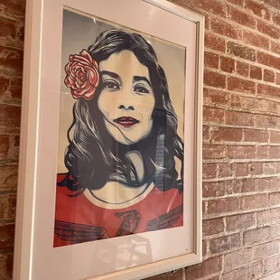 a woman with a flower in her hair