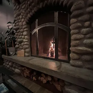 Fireplace outside of main restaurant.