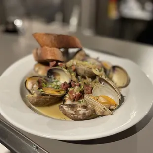 a plate of clams on a table