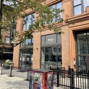 the front of a brick building