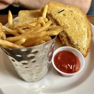 Turkey Pesto Melt Sandwich and fries