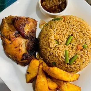 a plate of rice and chicken