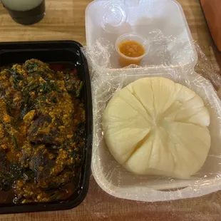 Engusi and fufu with beef and chicken for meat