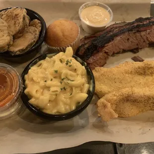 Combo platter (catfish &amp; brisket).  Sides: mac &apos;n cheese &amp; fried pickles.