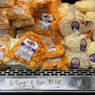 a variety of cheese and sausages
