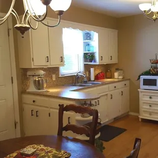 Painted Cabinets and Installed Countertops and Hardware