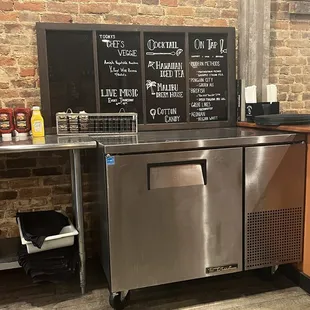 a stainless steel counter with a built in dishwasher