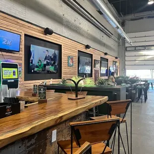 lounge area with tvs