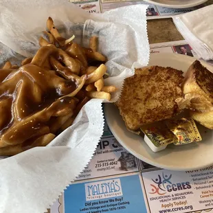 a grilled cheese sandwich and french fries