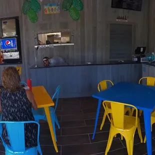 children sitting at tables