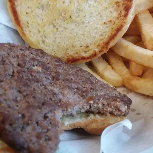 Thin patty but was not dry and very good toasted bun.