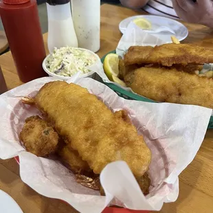 Sampler: 1 fish, 2scallop, 2 oysters, 2 prawn  with coleslaw  3fish with fries