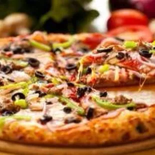 a pizza on a cutting board