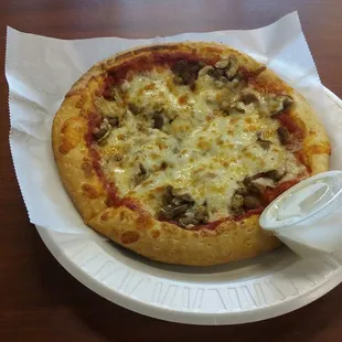 Small two-topping pizza (hamburger and mushrooms) with drink for $7.41 with tax.