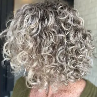 Curl by Curl cut and we will educate you on the best products to help you fall in love with curls again!