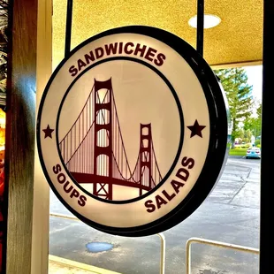 a sign for sandwich salads
