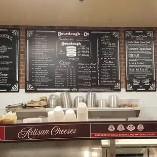 menus on a brick wall