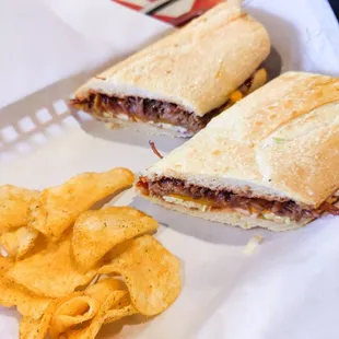 BBQ Brisket on sourdough w/cheddar cheese &amp; coleslaw.