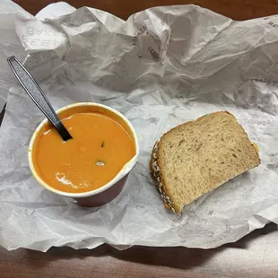 A cup of soup and half a cold grilled cheese for almost $20... Insanity!!!