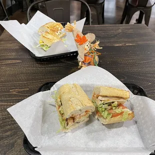 two sandwiches on a table