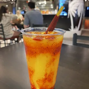 Mangonada - kind of like a mango slush with chamoy and tajin, they put mango bits in it too.