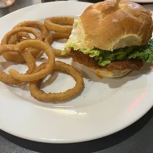 Buffalo chicken sandwich with onion rings