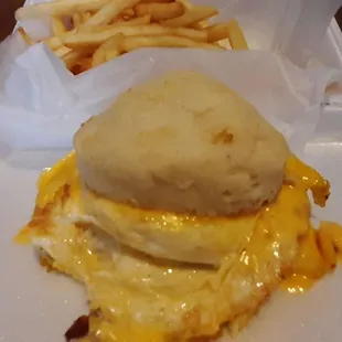1.75 egg biscuit,  .50 for cheese. Fries 2.75