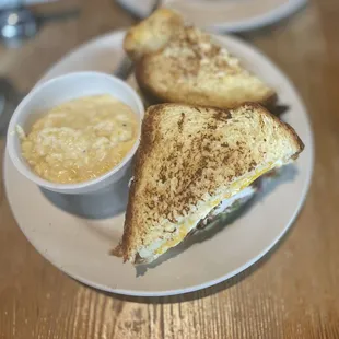 Fried Egg Sandwich no bacon/added fried chicken with roasted garlic grits