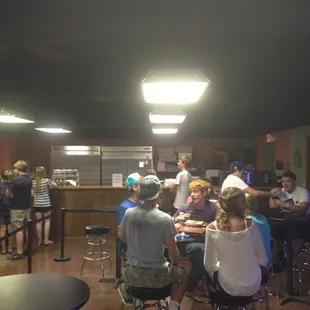 a group of people sitting at a table