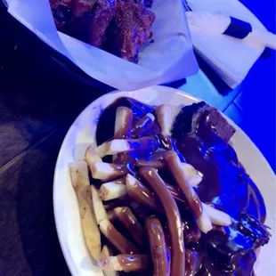 Hot roast beef sandwich and chicken wing basket