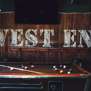 a pool table in a bar