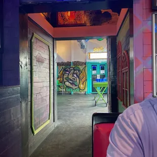 a man sitting in front of a tv