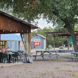 a picnic area with tables and chairs