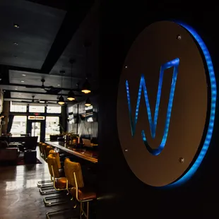 the neon sign for the restaurant