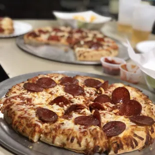 Party pizzas (prob digiorno's not delivery)