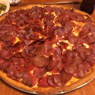 Massive amounts of pepperoni !  Ordered crispy