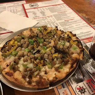 Seafood pizza.  Insanely delicious, worth every penny.