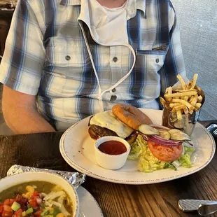 Wagu burger and bowl of green chili