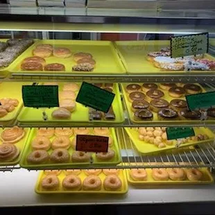 a display case filled with donuts