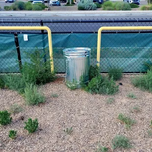 1 of 2 trash receptacles