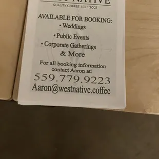 a menu and a glass of water