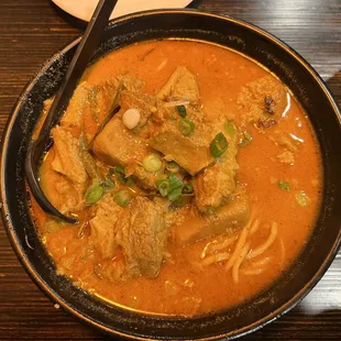 Curry beef brisket noodle soup with egg noodles