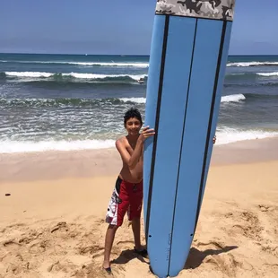 My teen after his first lesson! Up on his first wave!