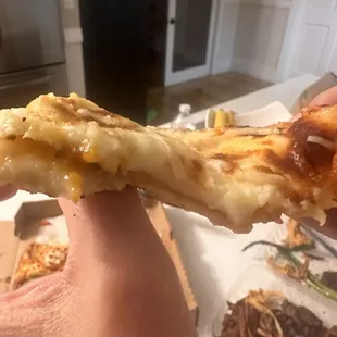 Sloppy cheesy pizza